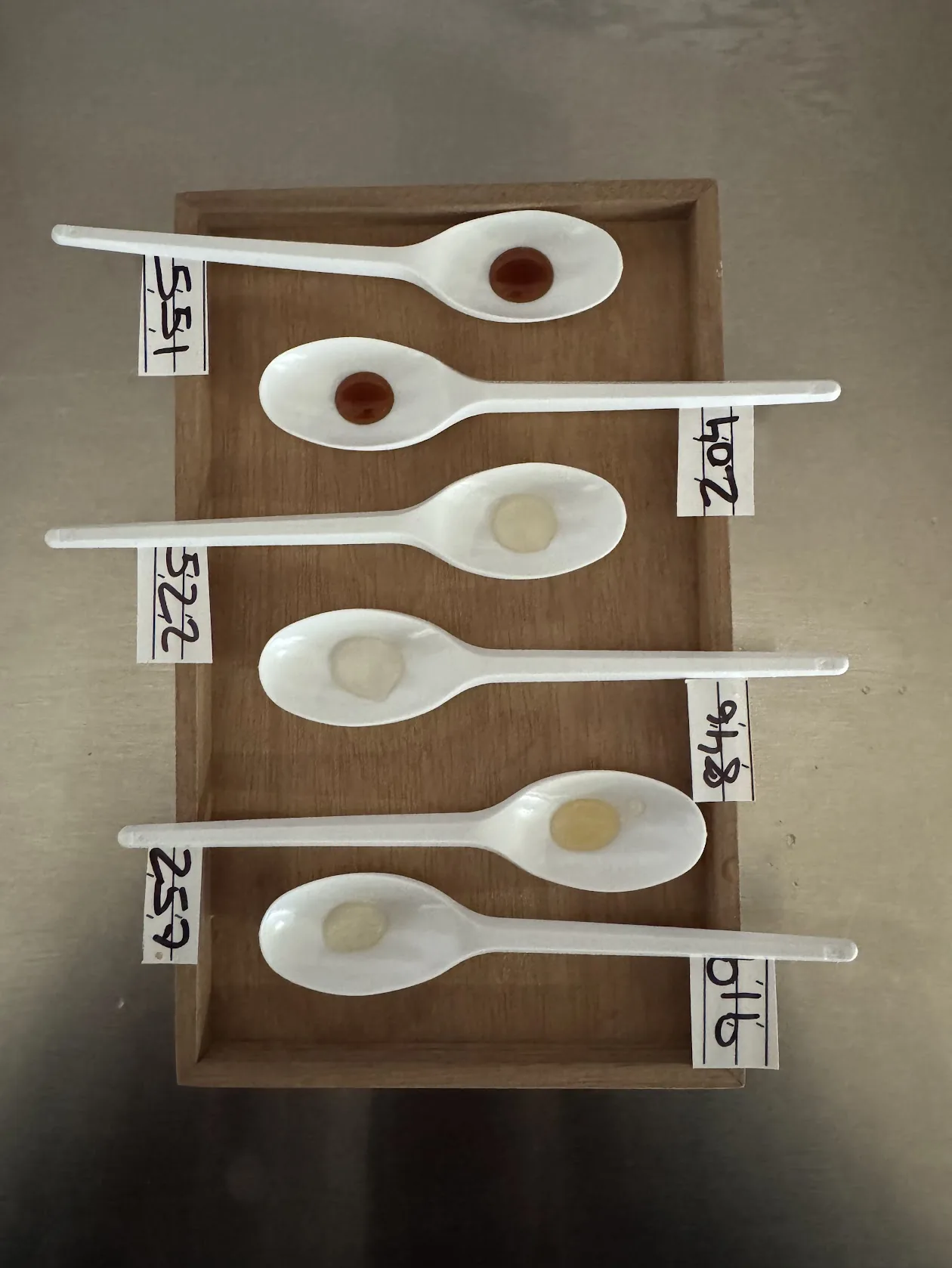 Numbered tasting spoons from the formulation tests.